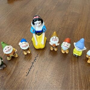 Vintage Disney circa 1970’s Snow White kneeling with the 7 dwarfs.